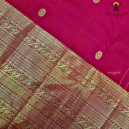 A vibrant Classic Vermilion Red / Bridal Red shade, beautifully complemented Saree