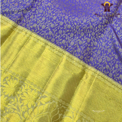 A rich royal violet/purple body paired with a lustrous gold zari Saree