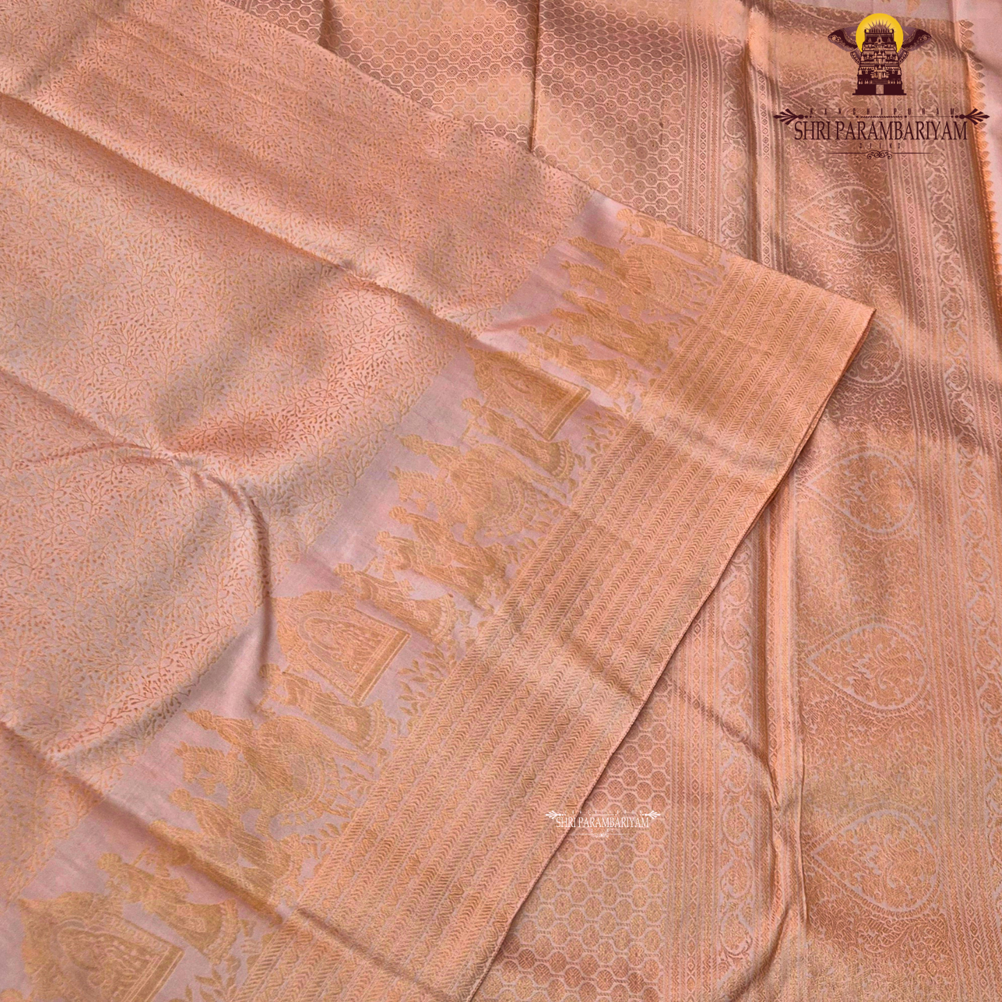 A soft peachy rose (muted bridal pink) shade with a warm undertone—an elegant Saree