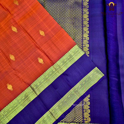 A rich Burnt Orange with Deep Aubergine Purple Border Saree