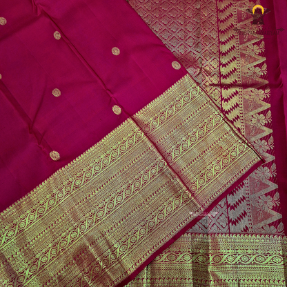 A vibrant Classic Vermilion Red / Bridal Red shade, beautifully complemented Saree