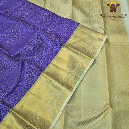 A rich royal violet/purple body paired with a lustrous gold zari Saree