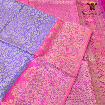 A rich lavender purple (soft violet tone) base with elegant silver zari work Saree
