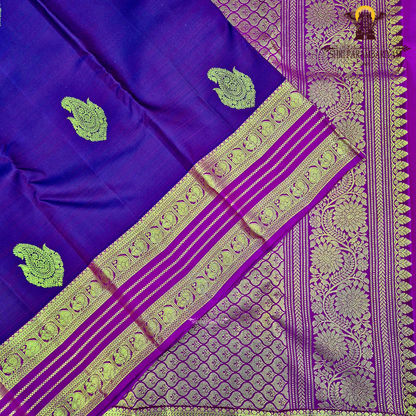 A rich dual-tone deep wine purple with magenta undertones Saree