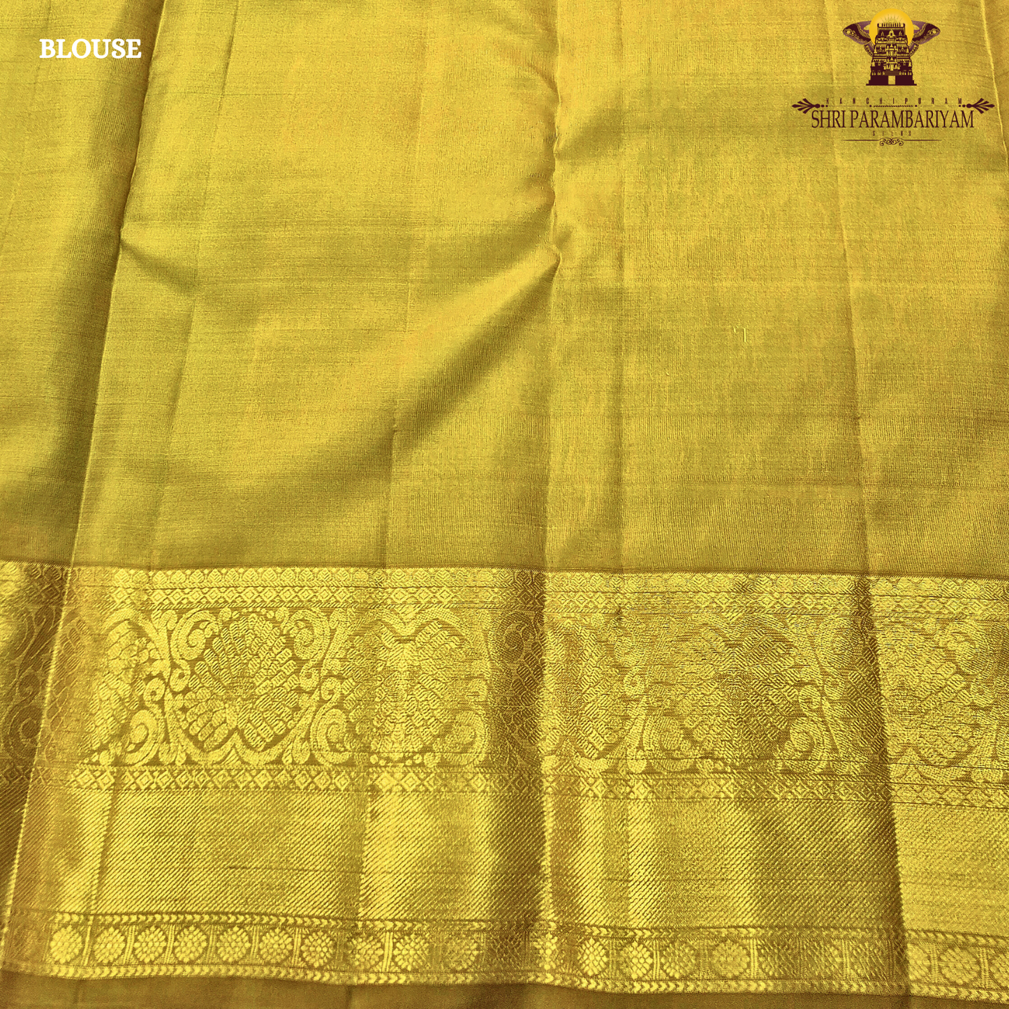 Rich teal green (peacock green tone) with a contrast gold zari border featuring a parrot green shade Saree