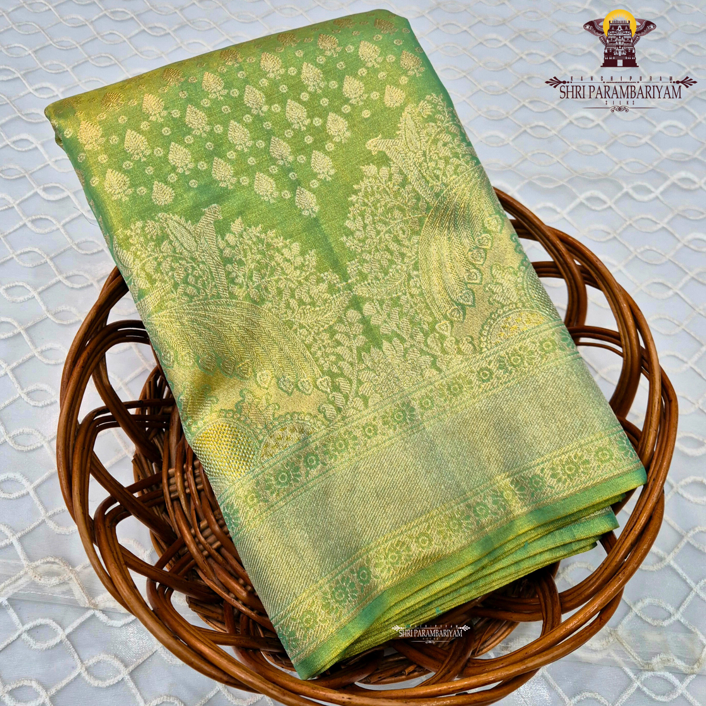 A rich parrot green shade beautifully highlighted with shimmering Saree