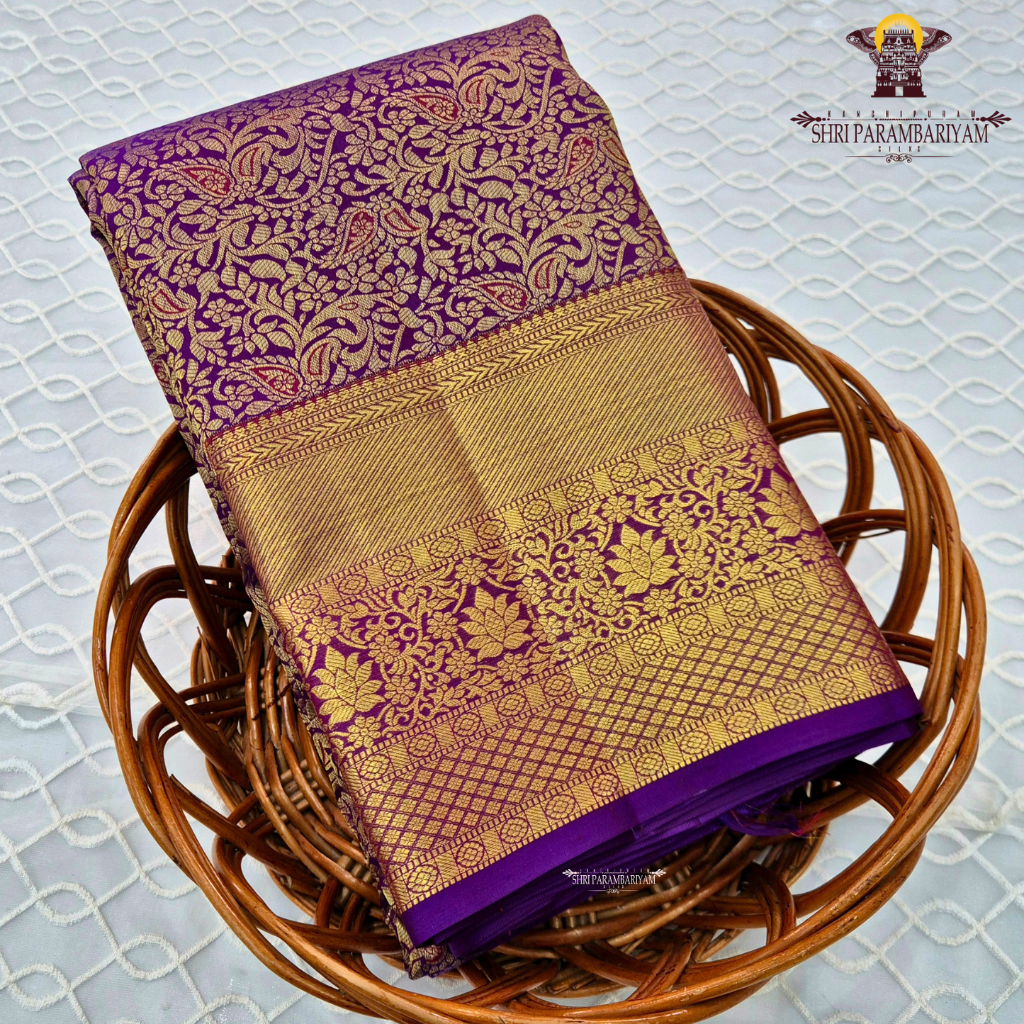 A rich magenta purple shade with luxurious antique gold zari Saree
