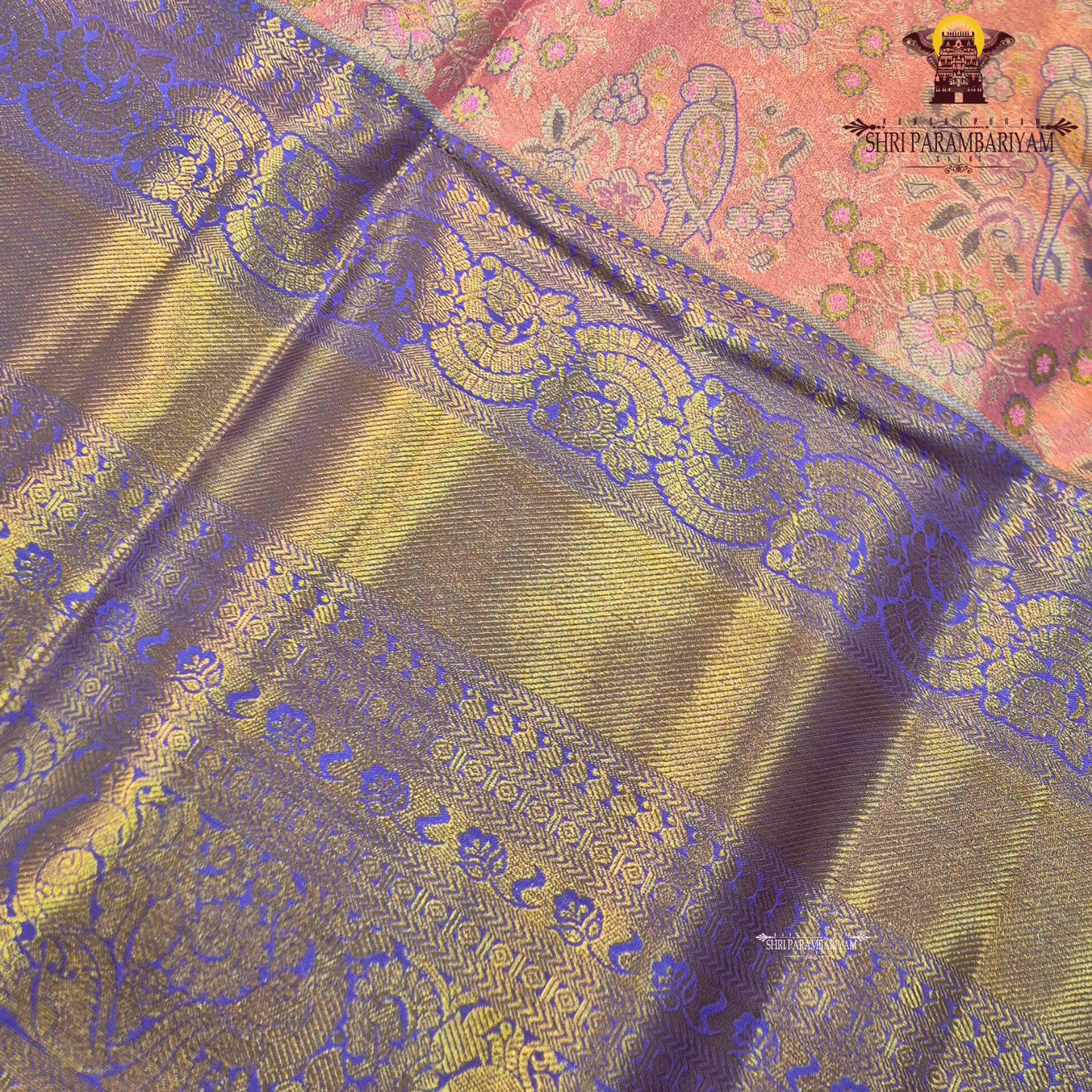 A beautiful dual-tone combination with a soft peach-pink body complemented Saree
