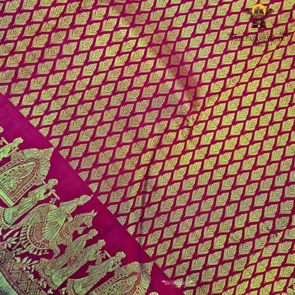 A rich and vibrant bridal red with lustrous gold zari work—classic Saree
