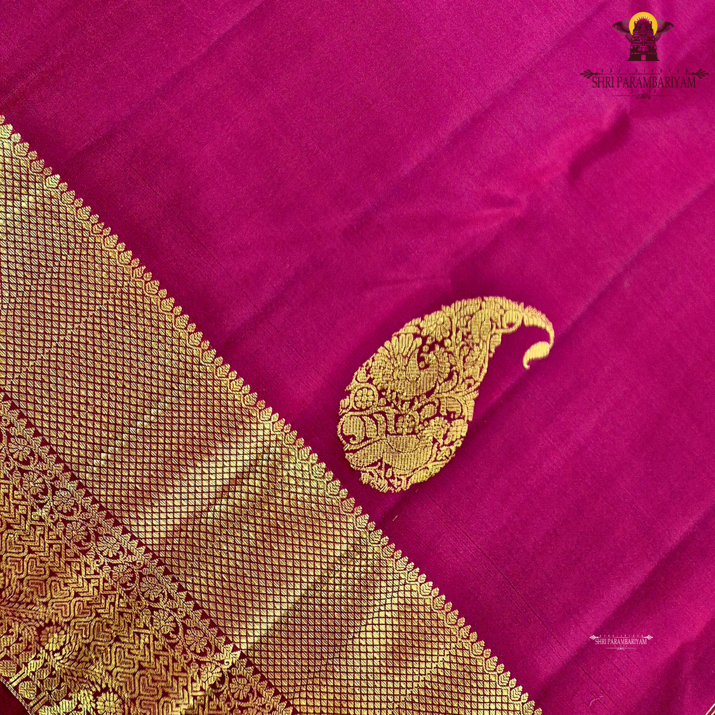 A Rich Wine Maroon with elegant Antique Gold Zari woven buttas Silk Saree