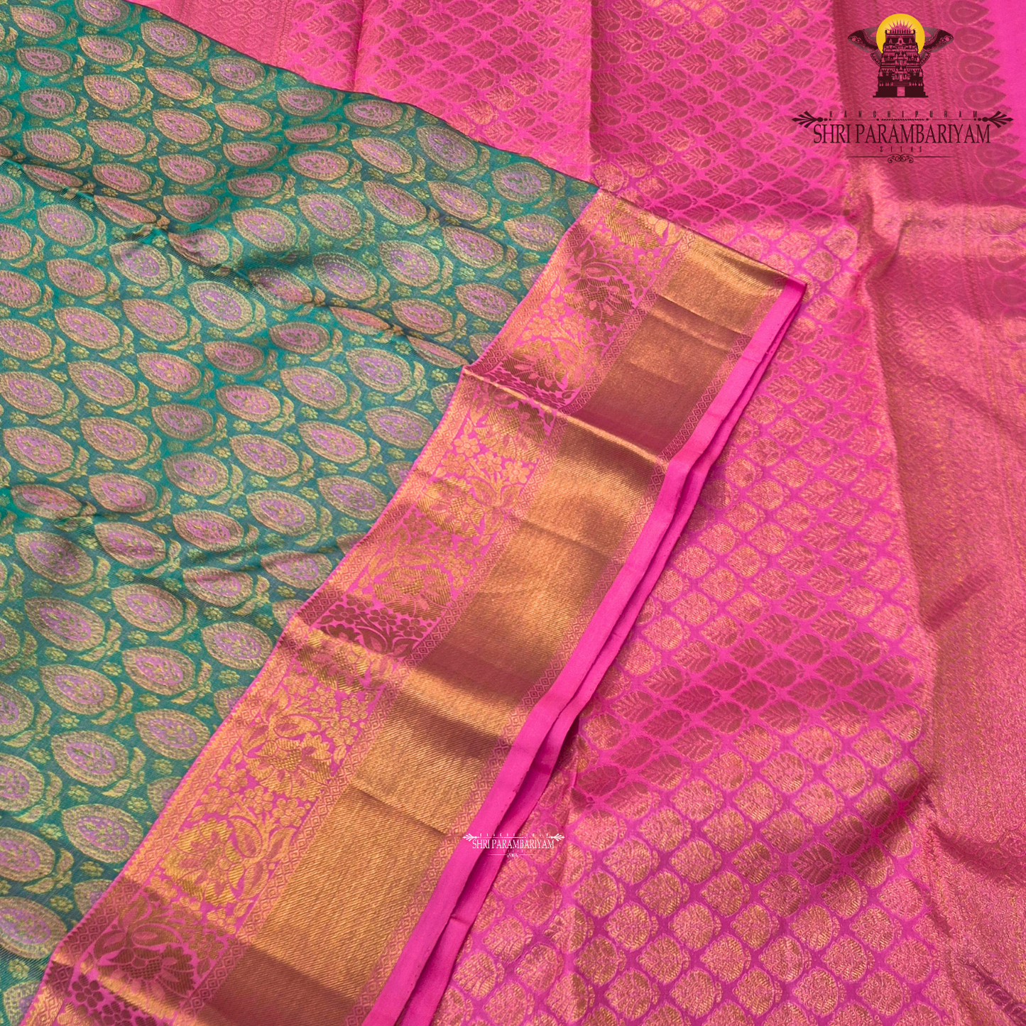 Peacock green (teal green) body with rich pink contrast border & pallu Saree