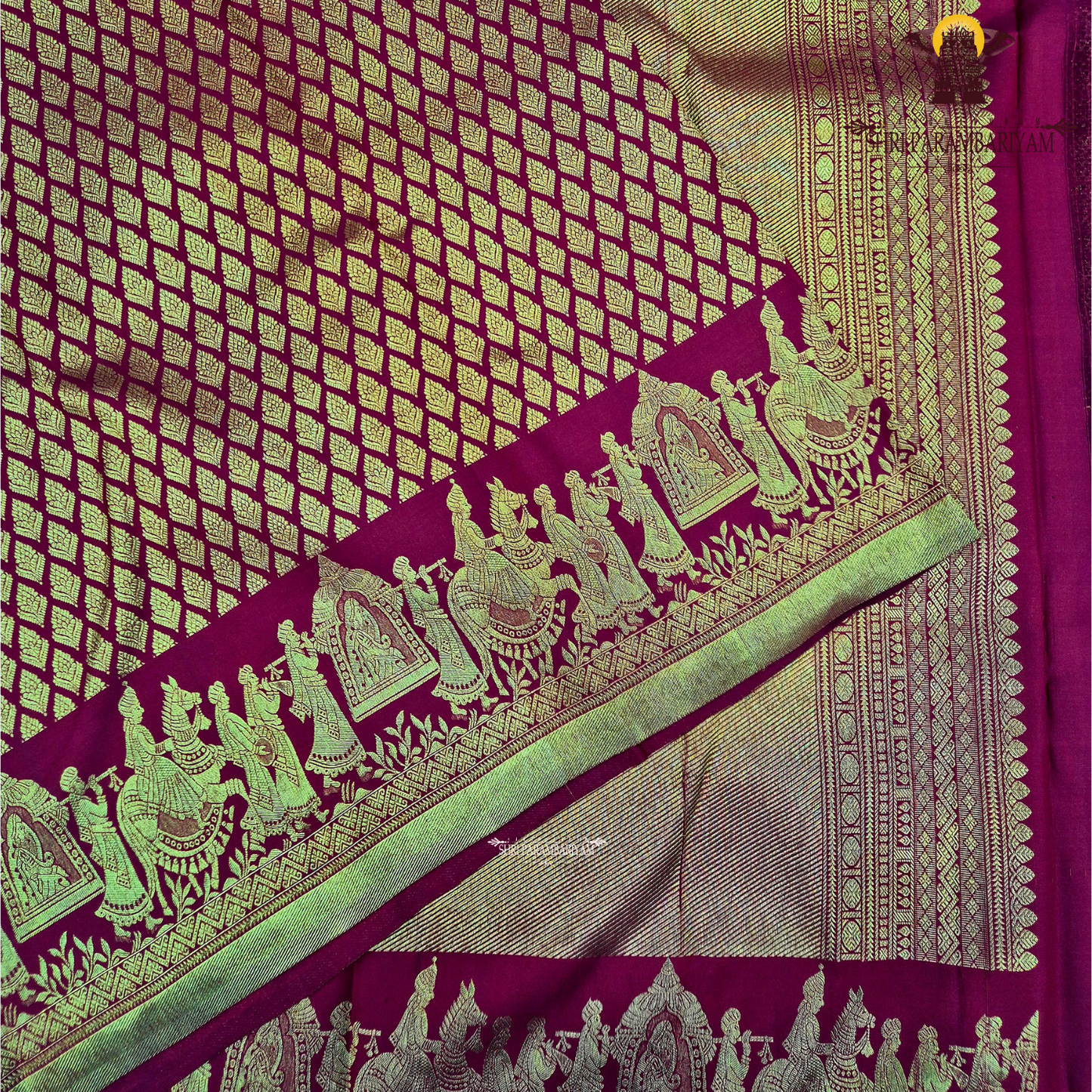 A rich and vibrant bridal red with lustrous gold zari work—classic Saree