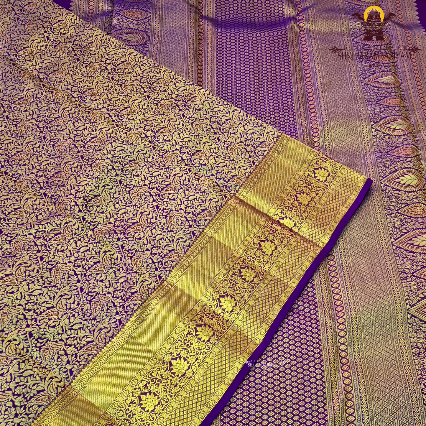 A rich magenta purple shade with luxurious antique gold zari Saree