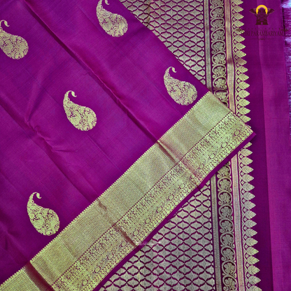 A Rich Wine Maroon with elegant Antique Gold Zari woven buttas Silk Saree