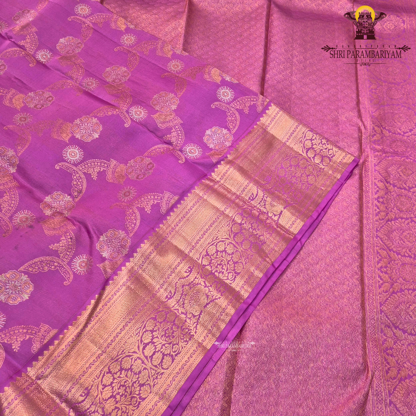 A bright and elegant rani pink (magenta tone) with rich gold zari Saree