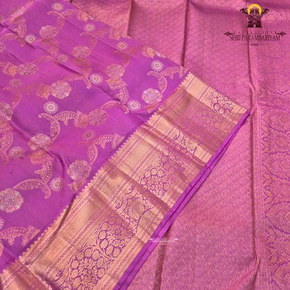 A bright and elegant rani pink (magenta tone) with rich gold zari Saree