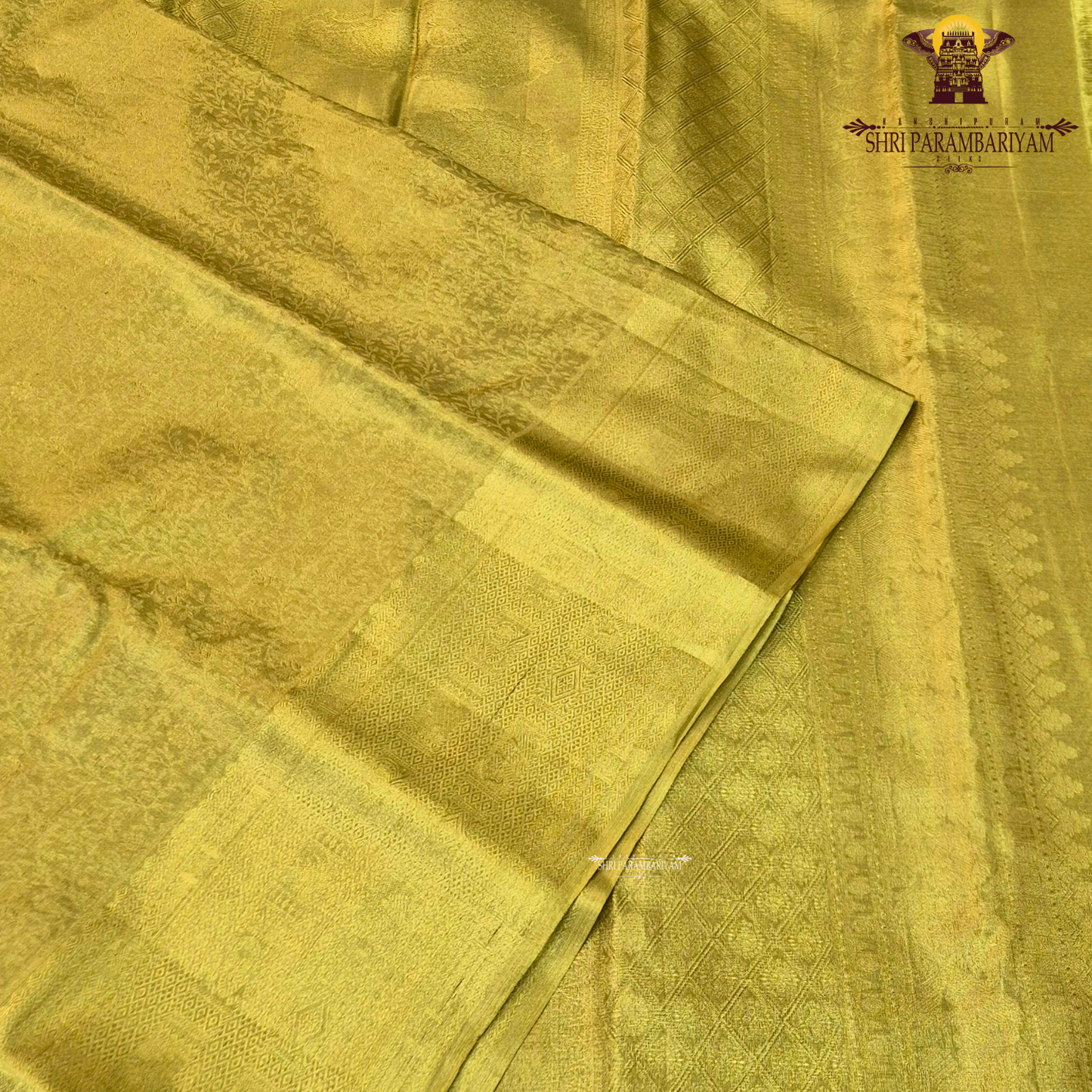 A rich golden yellow shade that beautifully reflects light Saree