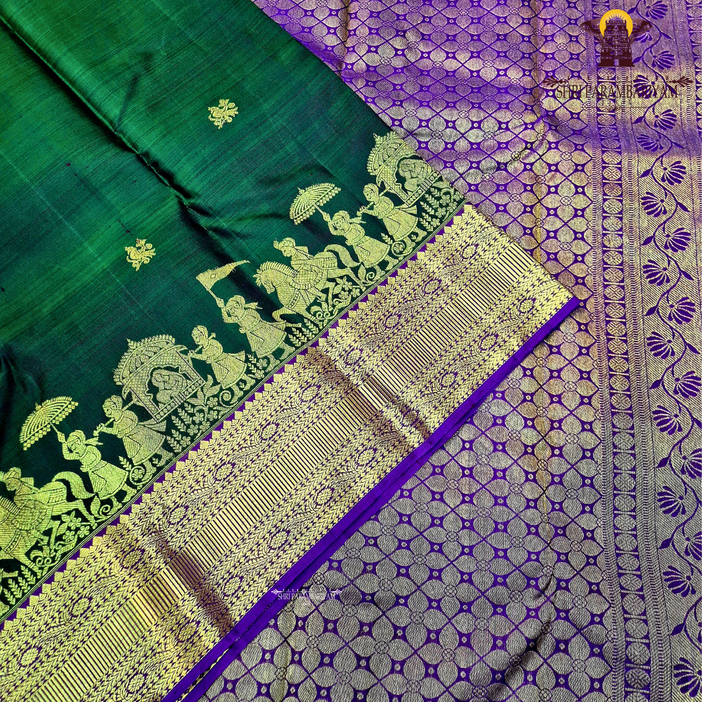 Deep bottle green body with a rich gold zari design Saree
