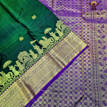 Deep bottle green body with a rich gold zari design Saree