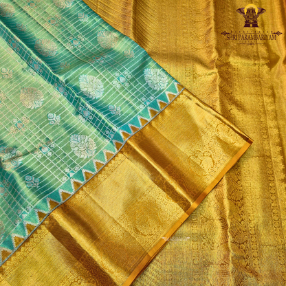 A fresh parrot green / leaf green with golden tissue sheen Saree