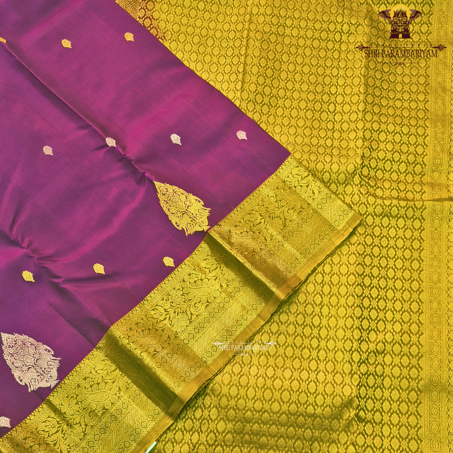 Rich royal purple (magenta-violet tone) with a contrasting antique gold zari border Saree
