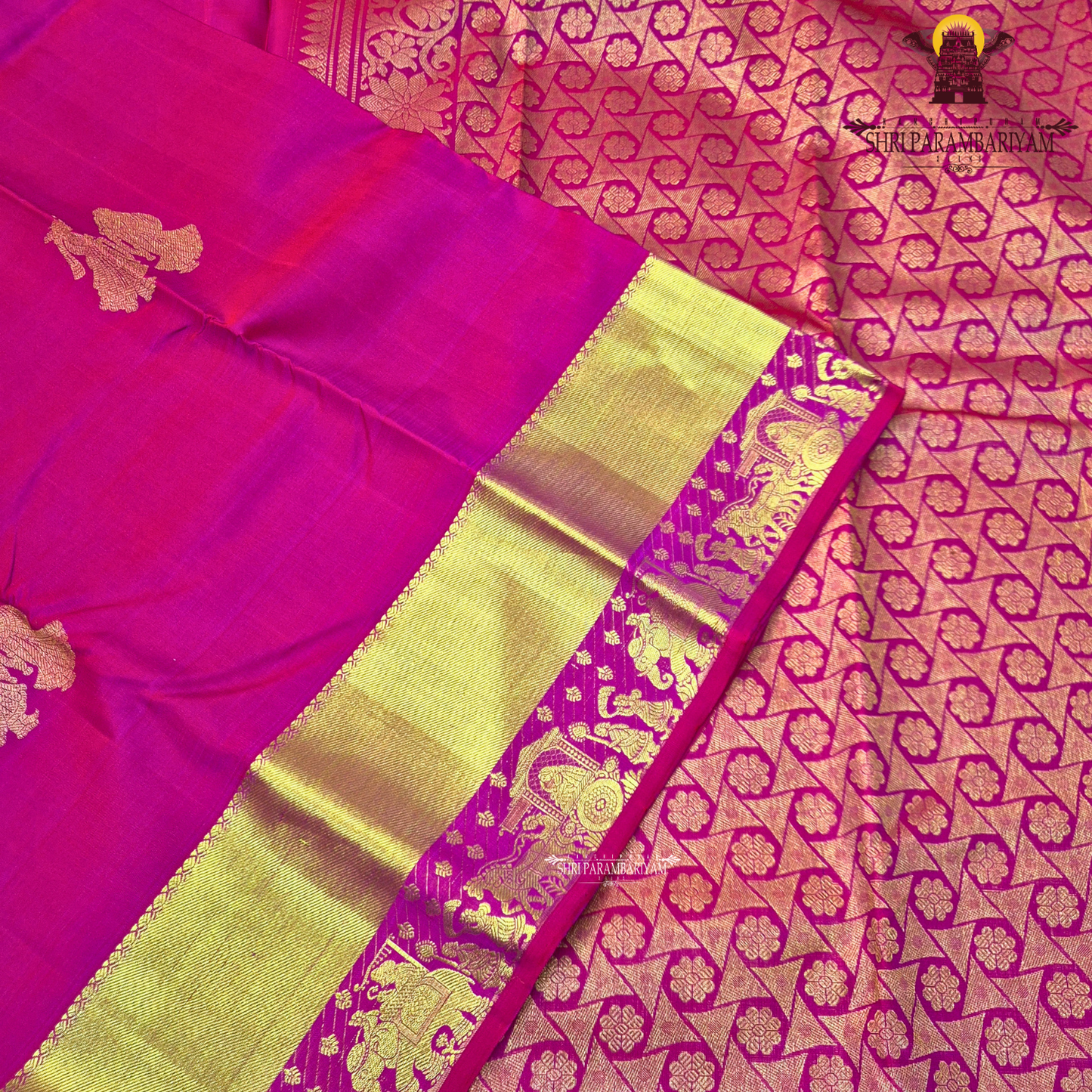 A bright Rani Pink with rich Gold zari Saree