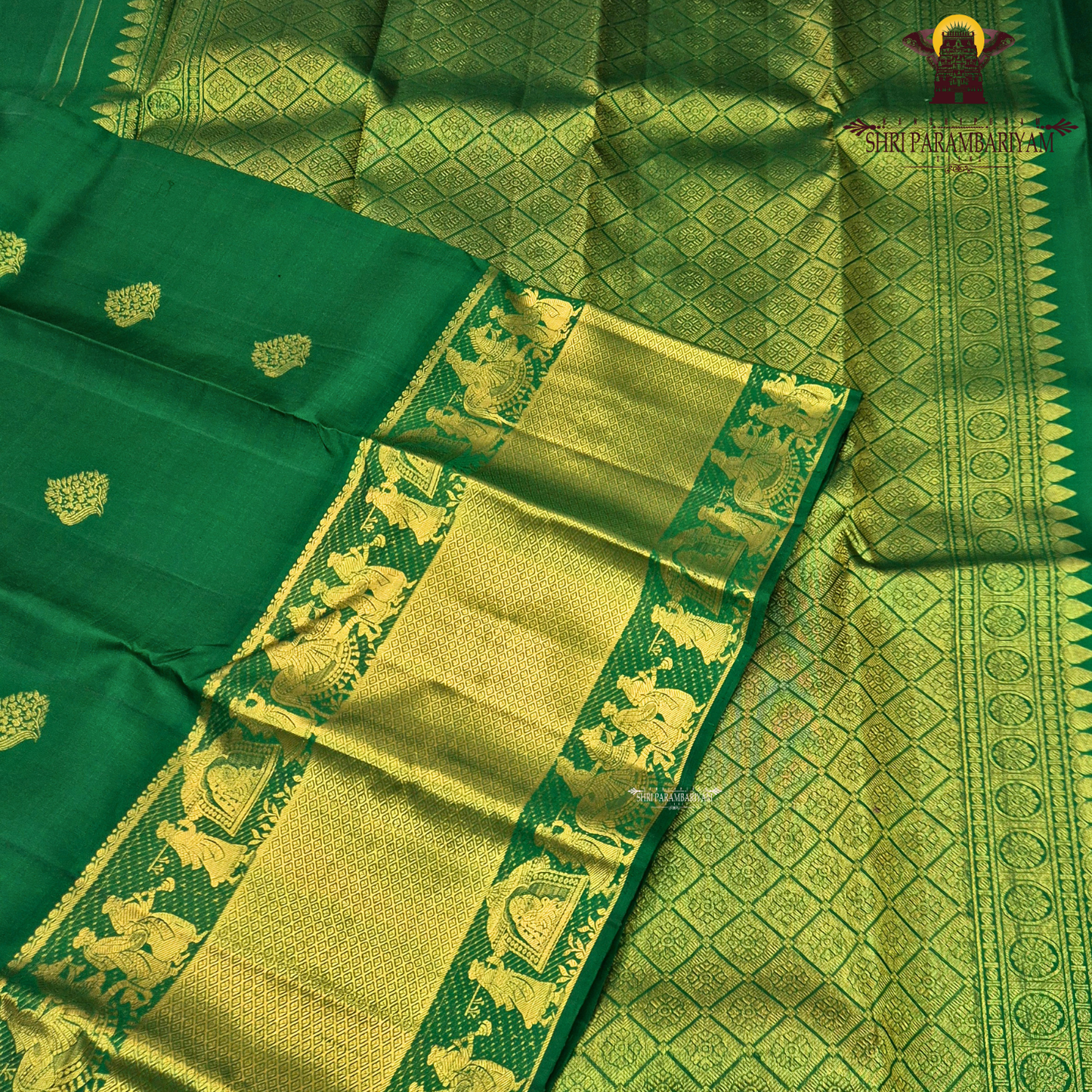 A rich Parrot Green with Antique Gold Zari Saree