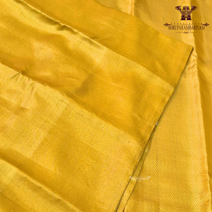 A rich mustard yellow (golden yellow) shade with a subtle shimmering Saree