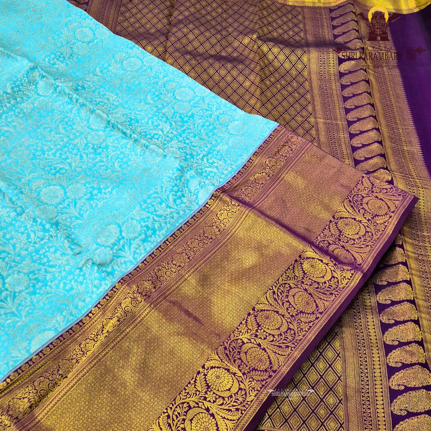 Elegant turquoise blue with Rich royal purple (violet) border Saree