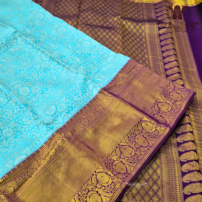 Elegant turquoise blue with Rich royal purple (violet) border Saree