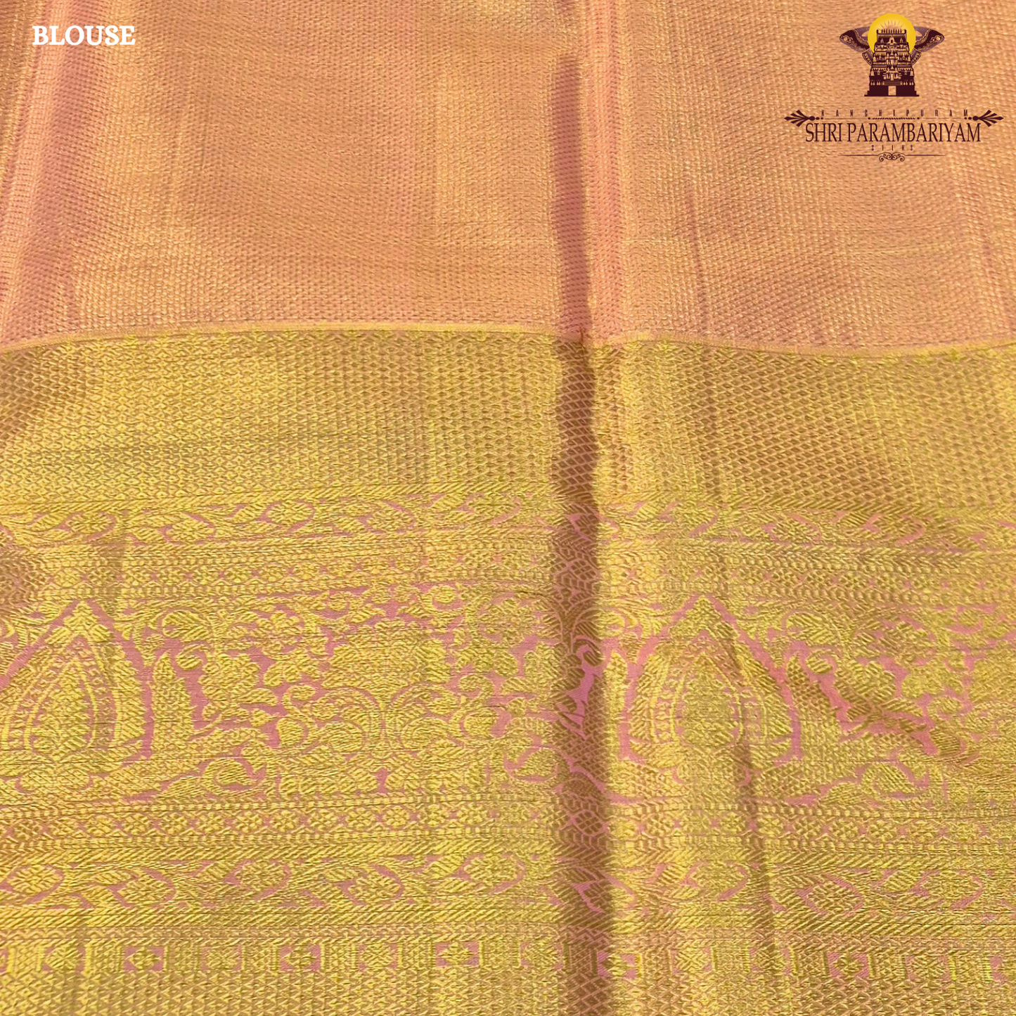 A rich golden tissue base with a soft peachy-pink undertone Saree