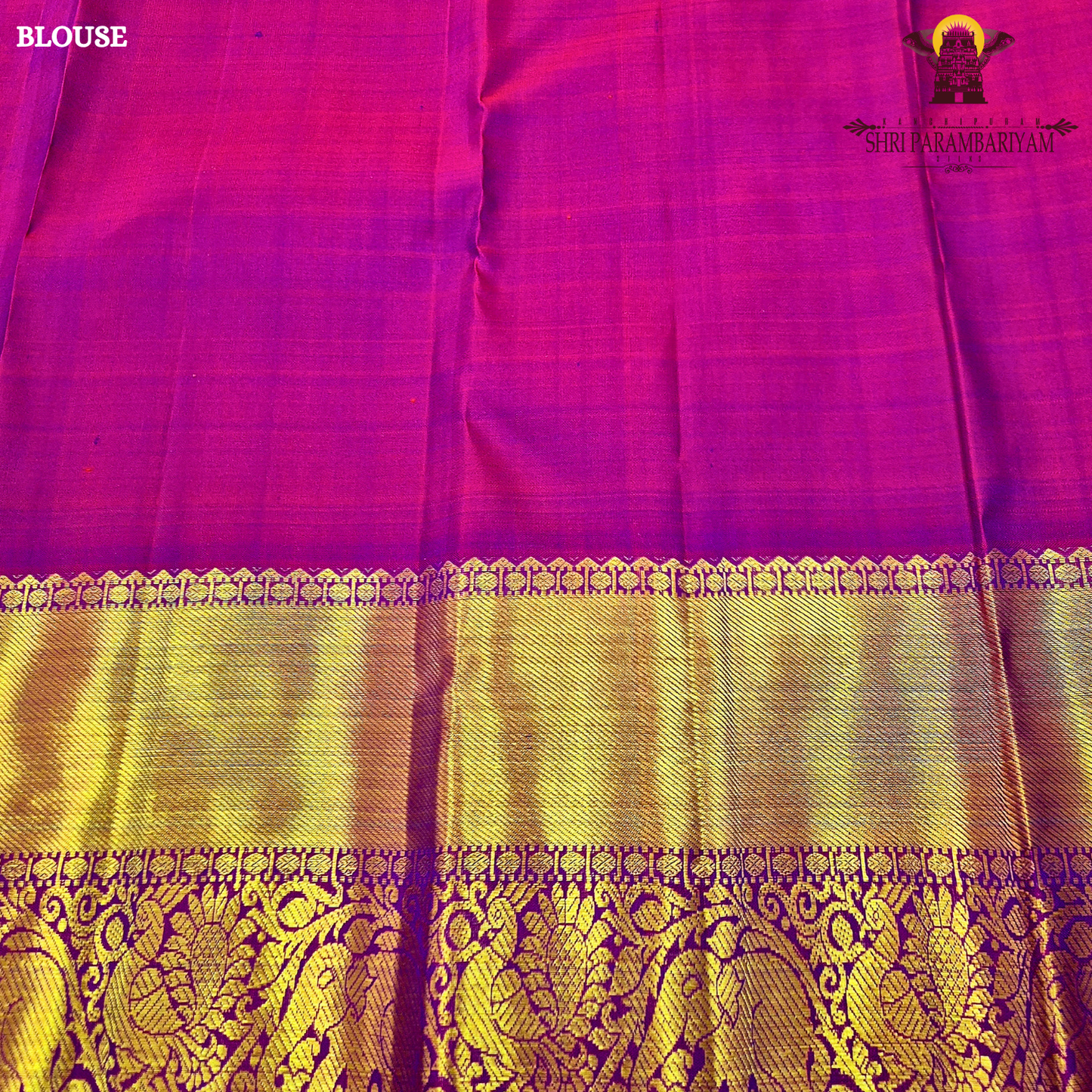 A subtle dual-tone olive green with a hint of gold sheen, paired with a contrast Saree