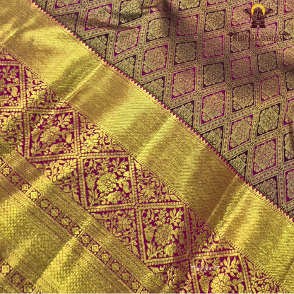 Rich rani pink (magenta) base with an opulent antique gold zari weave Saree