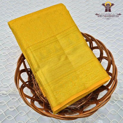 A vibrant turmeric yellow shade Saree