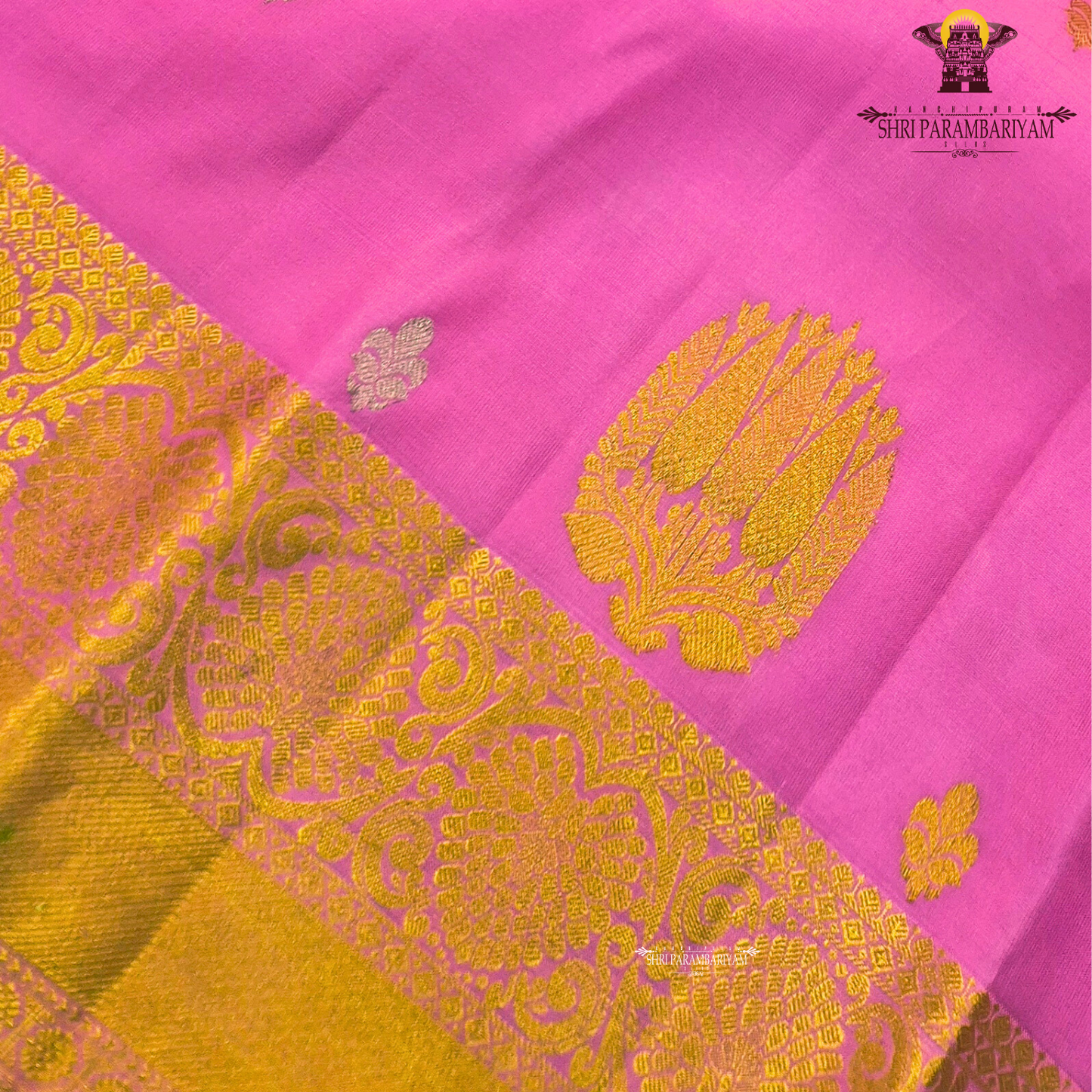 Elegant rose pink (lotus pink shade) with a rich gold zari border Saree