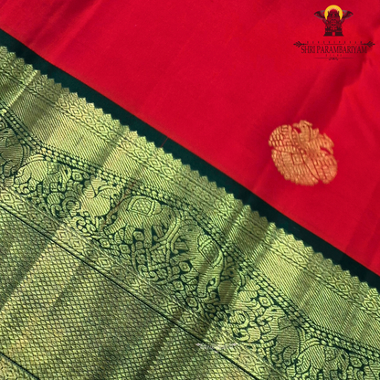 Bright Vermilion Red body with a deep Bottle Green border Saree