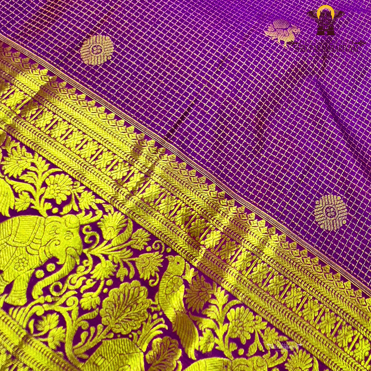 Vibrant royal purple shade, beautifully accentuated with gold zari Saree