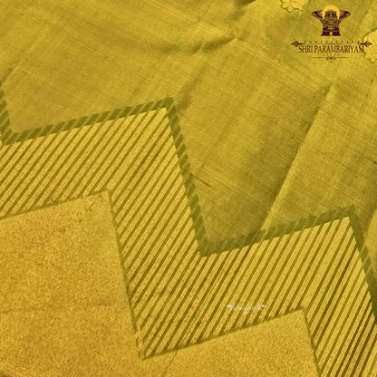 A sophisticated smoky taupe (greyish-brown) Saree