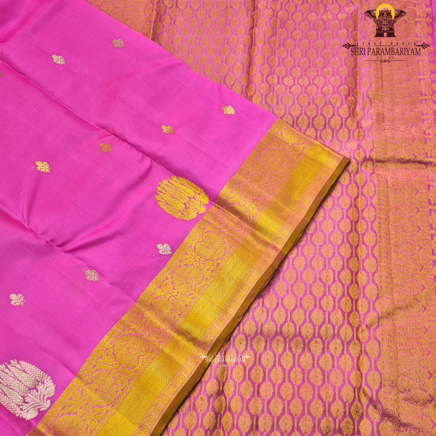 Elegant rose pink (lotus pink shade) with a rich gold zari border Saree