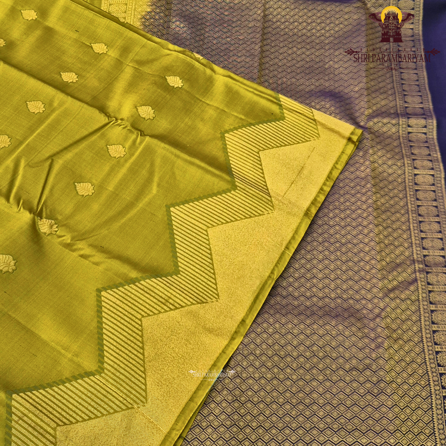 A sophisticated smoky taupe (greyish-brown) Saree