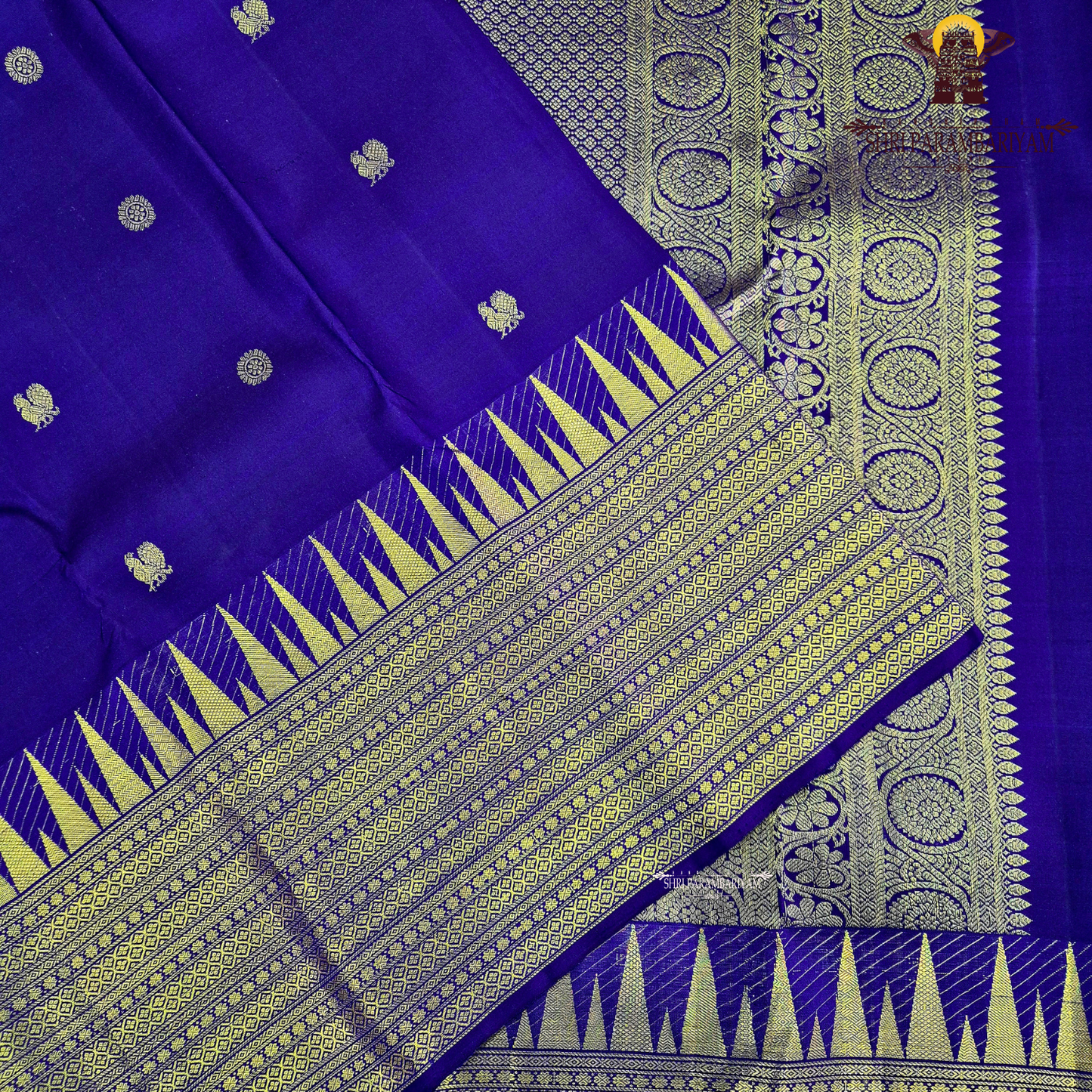 A royal Blue with rich Gold zari work Saree