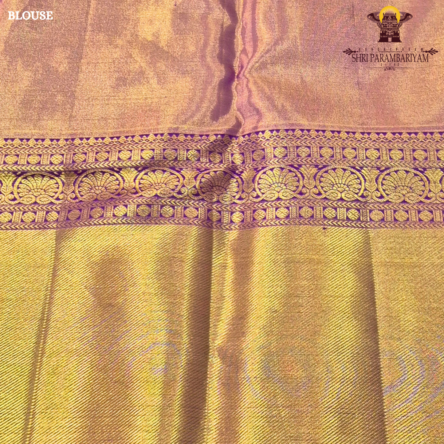 Rich antique gold/copper-toned tissue body paired with a vibrant deep magenta border Saree