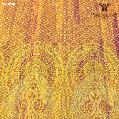 A vibrant parrot yellow / lime yellow tissue base paired with a rich magenta-pink Saree