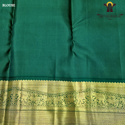Bright Vermilion Red body with a deep Bottle Green border Saree
