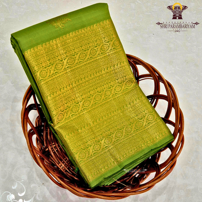 A rich Parrot Green with rich Gold zari work Saree
