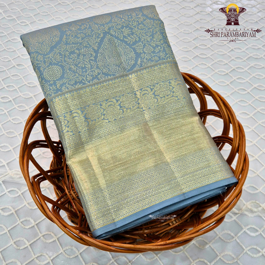 Elegant pastel blue / muted sky blue with rich gold zari Saree