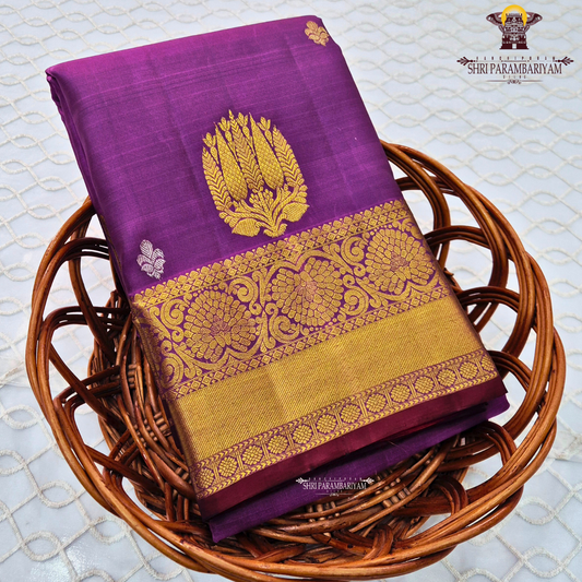 Royal violet (deep purple shade) with a rich antique gold zari border Saree