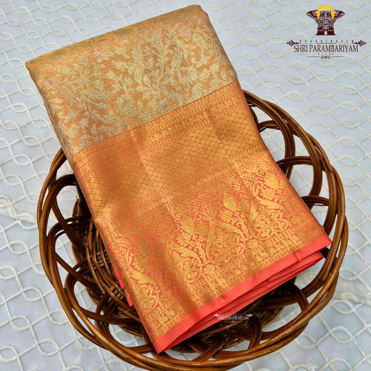 A beautiful peach gold body with a soft shimmering finish Saree
