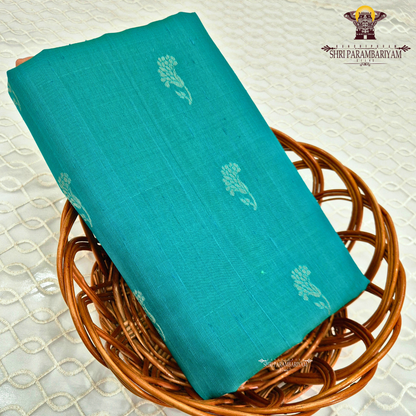 A rich peacock teal green shade that beautifully blends vibrance with elegance Saree
