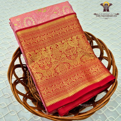 Soft pastel pink (tissue body) with a rich deep red border Saree